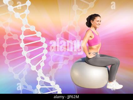 Composito Digitale della donna facendo esercizio con una sfera e una catena di DNA e i colori dello sfondo Foto Stock