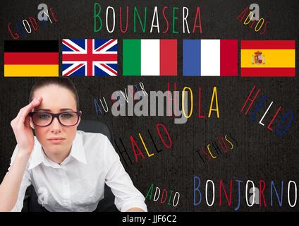 Composito Digitale della lingua principale flags over giovane donna con parole in diverse lingue in tutto. Foto Stock