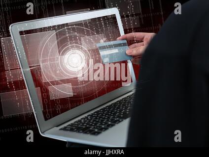 Close up 3D del pirata informatico mano utilizzando un computer portatile mentre in possesso di una carta di credito Foto Stock