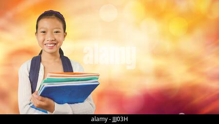 Scuola felice ragazza con libri Foto Stock