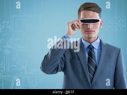 Business man in realtà virtuale auricolare contro blu disegnati a mano office Foto Stock