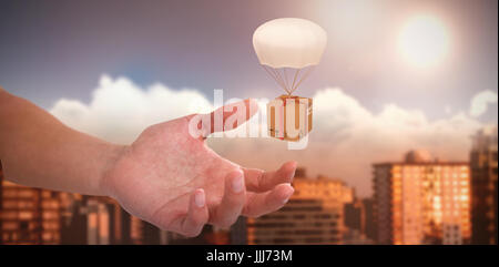 Composite immagine 3d di mano di uomo fingendo di tenere un oggetto invisibile Foto Stock