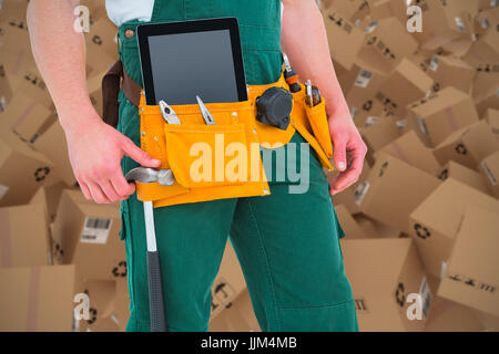 Composite immagine 3d di operaio edile utensili indossare la cinghia Foto Stock
