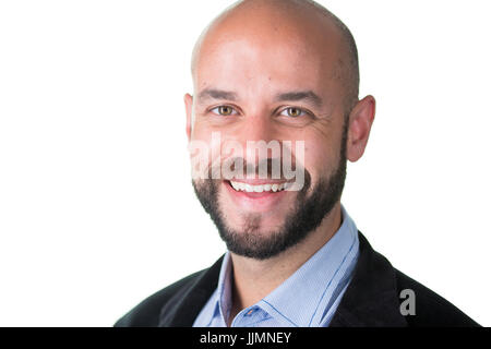 Closeup ritratto, professional uomo con pizzetto barba scura in blazer e camicia blu, isolato sfondo bianco Foto Stock