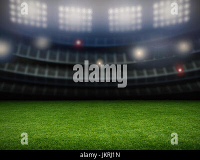 Stadio vuoto con campo di calcio di notte Foto Stock