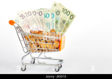 Carrello riempito con lo zloty polacco fatture e grosz monete. Foto Stock