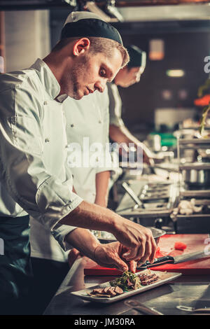 La preparazione tradizionale bistecca di manzo Foto Stock