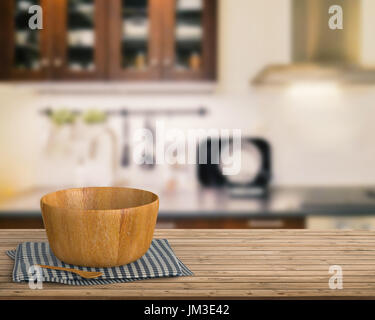 3D rendering stoviglie sul banco in legno con cucina sfondo sfocato Foto Stock