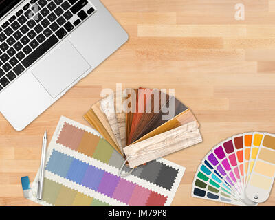 Vista superiore designer lavoro con computer notebook e la guida di colore Foto Stock
