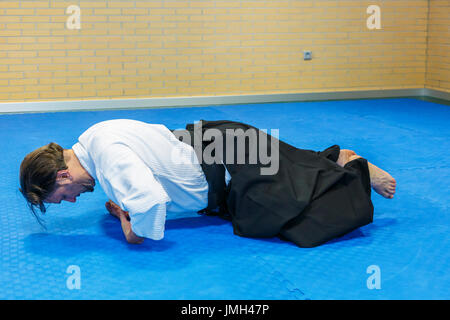 Aikido arte marziale scuola. Foto Stock