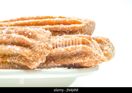 Churros isolati su sfondo bianco Foto Stock