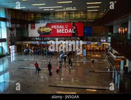 Singapore - 12 maggio 2016. L'immigrazione Hall presso l'Aeroporto Changi di Singapore. Il Changi Intl Airport è uno dei più importanti hub di trasporto nel sud-est Foto Stock