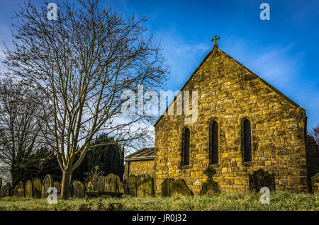 Parti di San Cuthbert risale al 1180. Essa è stata bruciata dal confine Reivers e ricostruito con AA Barrel-Vaulted Rare tetto in pietra Foto Stock