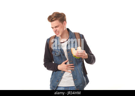 Studente di mangiare panino marcio Foto Stock