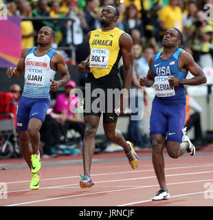 La Giamaica Usain Bolt (centro) termina la seconda negli uomini 100m semi-finale riscaldare tre accanto a USA Christian Coleman e Gran Bretagna Chijindu Ujah durante il giorno due del 2017 IAAF Campionati del mondo presso il London Stadium. Foto Stock