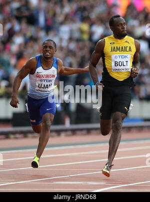 Gran Bretagna Chijinda Ujah (sinistra) e della Giamaica Usain Bolt (seconda a sinistra) negli uomini 100m semi-finale riscaldare tre durante il giorno due del 2017 IAAF Campionati del mondo presso il London Stadium. Foto Stock