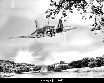 Bassa battenti Spitfire a Lytham Mulino a vento, Inghilterra Foto Stock