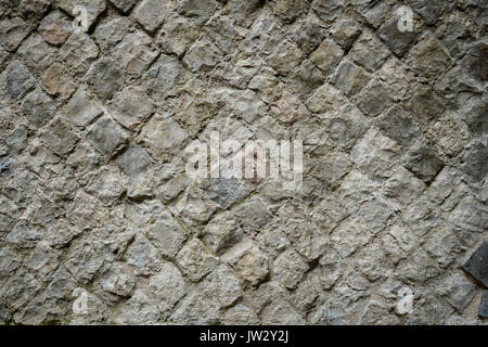 Esempio di antico romano opus reticulatum parete. Foto Stock