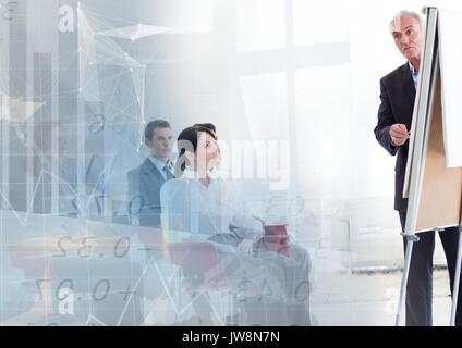 Digital composito di economia aziendale insegnante con la classe Foto Stock