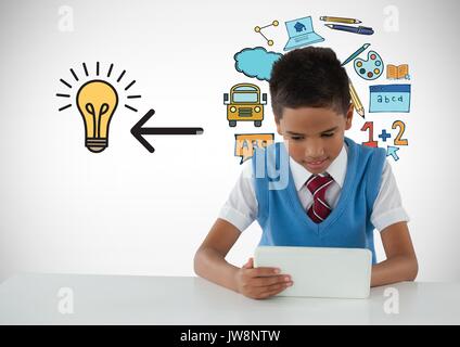 Digital composito di scolaro su tablet con istruzione lampadina graphics Foto Stock