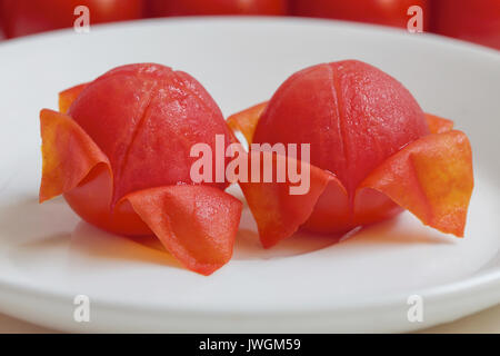 I pomodori sono una fonte eccellente di vitamina C Foto Stock