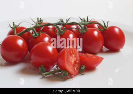 I pomodori sono una fonte eccellente di vitamina C Foto Stock