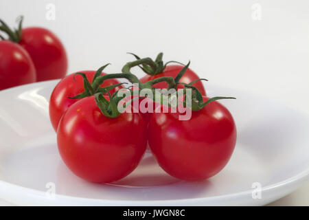 I pomodori sono una fonte eccellente di vitamina C Foto Stock