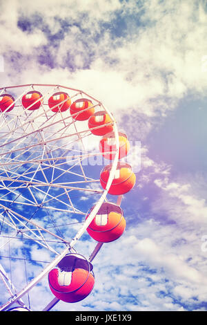 Vintage foto dai toni di una ruota panoramica Ferris. Foto Stock