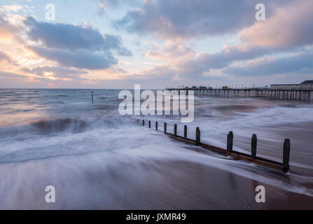 Teignmouth molo presso sunrise nel Devon. Foto Stock