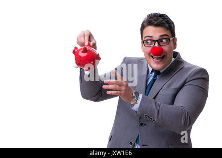 Funny clown imprenditore con un salvadanaio isolati su sfondo bianco Foto Stock