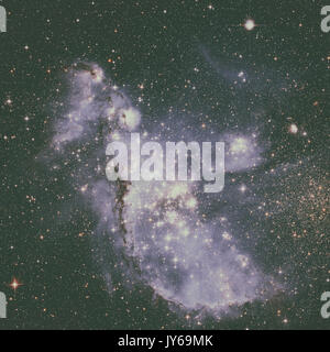 Il piccolo Magellanic Cloud è un nano galassia irregolare nei pressi della Via Lattea, trova 210.000 anni-luce di distanza. Ritoccato immagine colorata. Gli elementi di questo Foto Stock