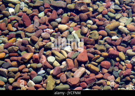 Color rocce del lago McDonald Glacier Park Foto Stock