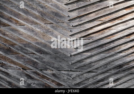 La texture, grigio assi inchiodati alla parete di pannelli di legno. La foto in orizzontale, sfondo Foto Stock