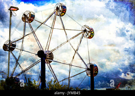 Ruota panoramica Ferris guidare in una fairgound Foto Stock