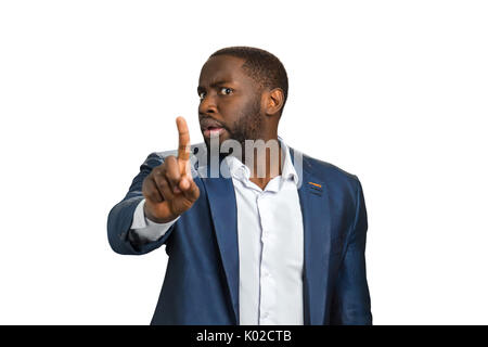 Imprenditore si ferma con un gesto di mano. Uomo con accigliata sopracciglio che mostra il dito n. Barba Uomo con testa rivolta indicando con il dito stop. Foto Stock