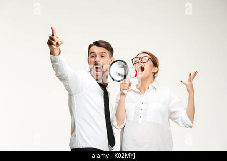 Ascolto, megafono, grida. Foto Stock