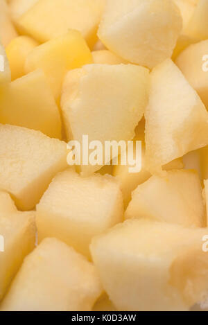 Immagine ravvicinata di giallo diverse fette di melone Foto Stock
