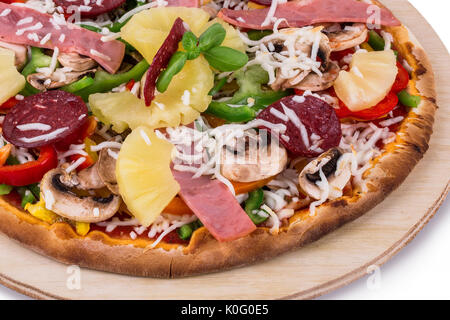 Close up non cotte ananas hawaiani Pizza Foto Stock