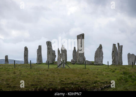 Callanish pietre in piedi in un giorno nuvoloso, , pietre permanente posto in una configurazione a croce con al centro un cerchio di pietra, Callanish, Scotland, Regno Unito Foto Stock