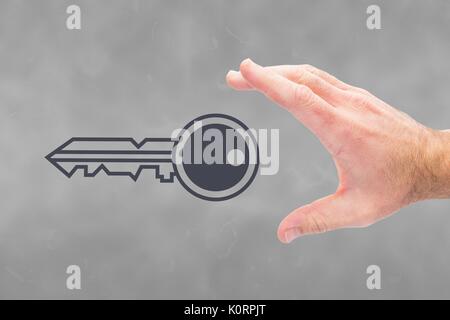 Composito Digitale della mano che tiene le chiavi Foto Stock