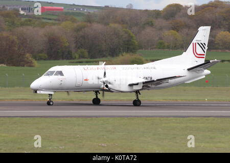 G-GNTB, una Saab 340 azionato da Loganair, durante il corso di formazione a Glasgow Prestwick International Airport in Ayrshire. Foto Stock