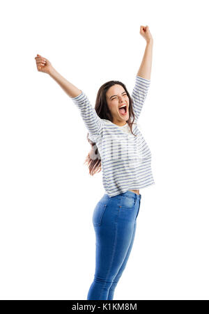 Donna felice con le braccia in alto e urla di felicità Foto Stock