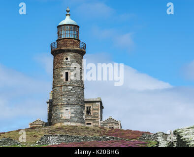 Faro superiore torre sul polpaccio dell uomo Foto Stock