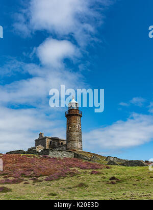 Faro superiore torre sul polpaccio dell uomo Foto Stock