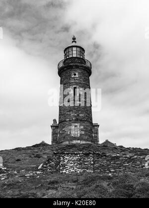 Faro superiore torre sul polpaccio dell uomo Foto Stock