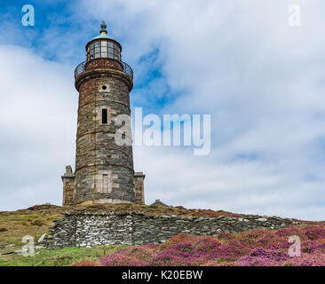 Faro superiore torre sul polpaccio dell uomo Foto Stock