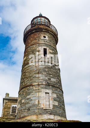 Faro superiore torre sul polpaccio dell uomo Foto Stock