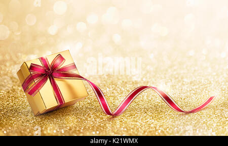Confezione regalo con nastro contro bokeh sfondo luci Foto Stock