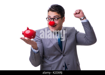 Funny clown imprenditore con un salvadanaio isolati su sfondo bianco Foto Stock