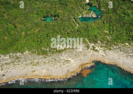 Vista aerea del cenotes, fori di acqua dolce situato in tutta la penisola dello Yucatan, Messico Foto Stock